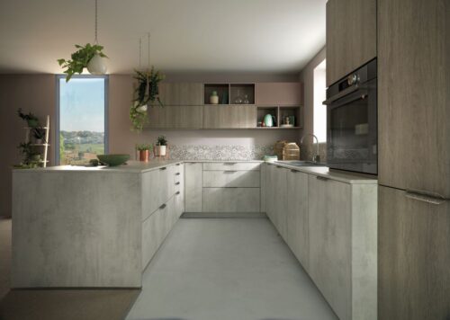 Die „Arcos Marvel Light“ von Schmidt Küchen zeigt sich in einem hellen Betondekor. Es lässt sich toll zum Beispiel zu Holz oder unifarbenen Fronten kombinieren. Foto: Schmidt
