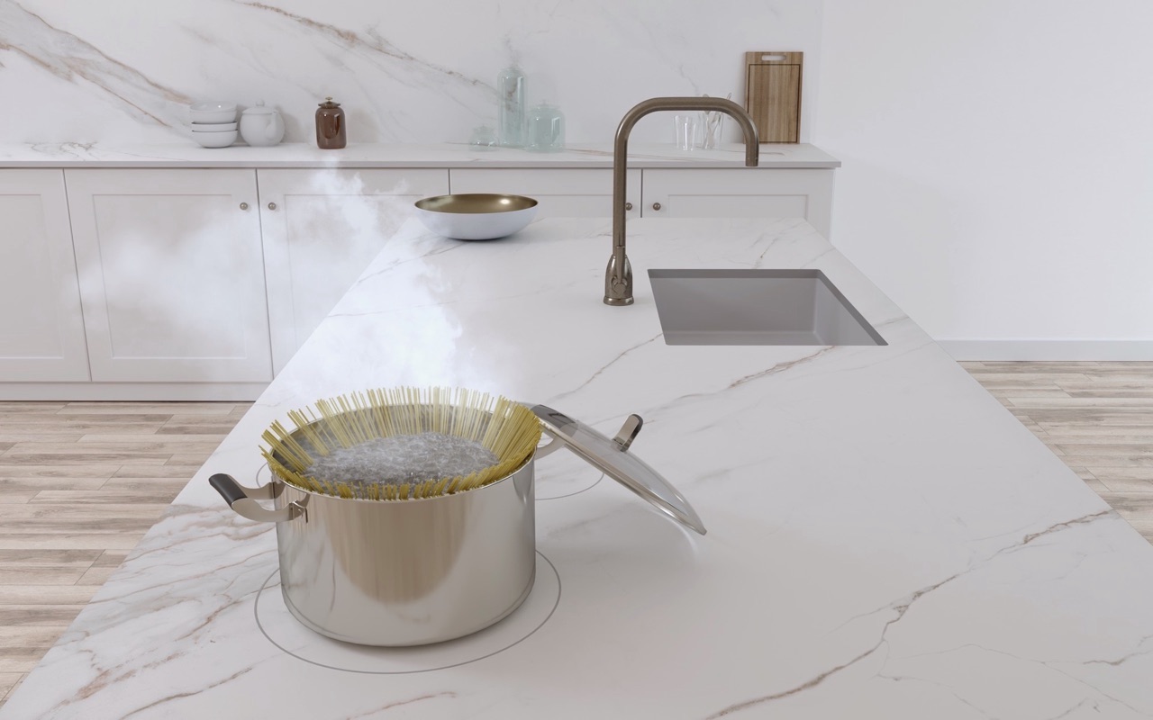 Was auf den ersten Blick wie eine einfache Platte aussieht, verbirgt ein integriertes Induktionskochsystem, das innovatives Design mit hoher Vielseitigkeit verbindet. Foto: Cooking Surface | ABK Group