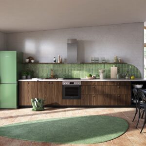 Die mediterrane Küche erhält durch das „Waldmeister“-Grün einen perfekten Akzent. Das wirkt natürlich, aufgeräumt und lebendig. Küche aus Nussbaum-Nachbildung von Küche & Co.