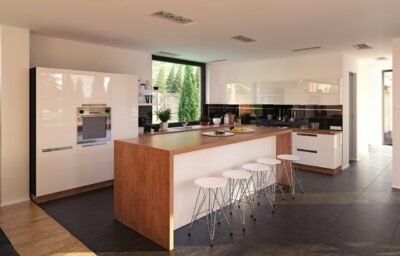 Eine moderne Küche mit einer stilvollen Glasrückwand, die Eleganz und Funktionalität vereint. Die Glasfläche reflektiert das Licht und sorgt für eine helle und großzügige Atmosphäre, während sie gleichzeitig leicht zu reinigen ist und Schutz bietet. Foto by Unsplash