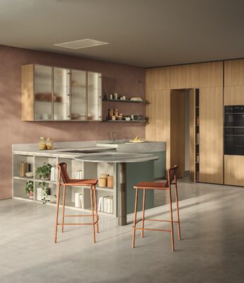 Die Küche von Scavolini präsentiert sich frisch mit ihrem Farbmix. Unterschrankfronten aus dem melaminbeschichteten Dekor „Forest“ werden gemeinsam mit den Hochschrankfronten aus melaminbeschichtetem Dekor „Gold Oak“ zur kompakten Küche. Der runde Ansatztisch sorgt für Lebendigkeit und ist noch dazu ein schöner Essplatz. Die Arbeitsplatte besteht aus Porzellankeramik-Steinzeug in der Farbe „Perla“, der Tisch und die Spüle sind mit der Platte „Mint Cosmolite“ gestaltet.